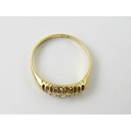 523 - An Edwardian 18ct gold and diamond navette or boat shaped ring, set with 5 old cut diamonds, finger ... 