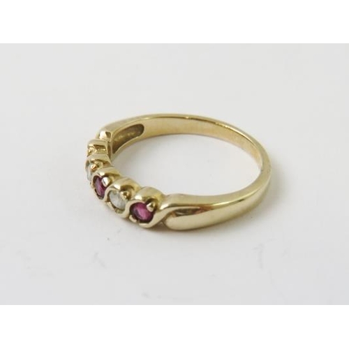 529 - A 9ct yellow gold ruby and diamond half hoop ring, approx 0.10cts diamonds, finger size L 1/2, 2.4gm... 