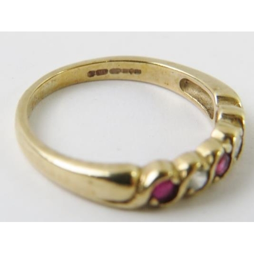 529 - A 9ct yellow gold ruby and diamond half hoop ring, approx 0.10cts diamonds, finger size L 1/2, 2.4gm... 