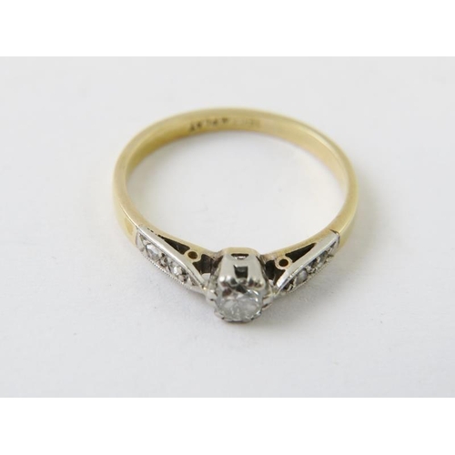 530 - A diamond solitaire ring in precious metal stamped 18ct PLAT, the round brilliant cut diamond approx... 