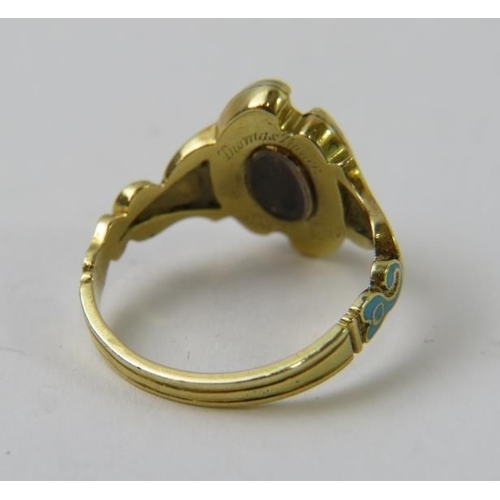 535 - A Private collection of mourning rings: An early Victorian 18ct gold mourning ring set with an old m... 