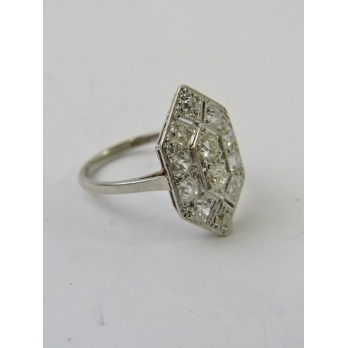 572 - An Art Deco style white precious metal and diamond tablet ring, the setting measuring approx 20mm x ... 