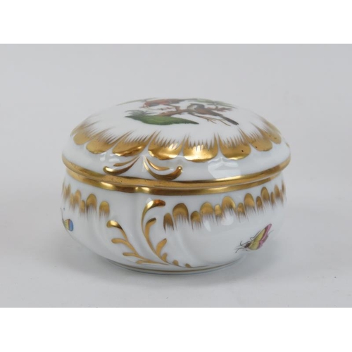 60 - Three porcelain boxes and a Herend porcelain reticulated potpourri pot with cover, 20th century. Com... 