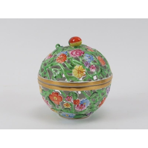 60 - Three porcelain boxes and a Herend porcelain reticulated potpourri pot with cover, 20th century. Com... 