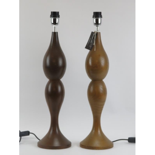 62 - Two large Heathfield & Co turned wood table lamps, 21st century.
Condition report: Light age related... 