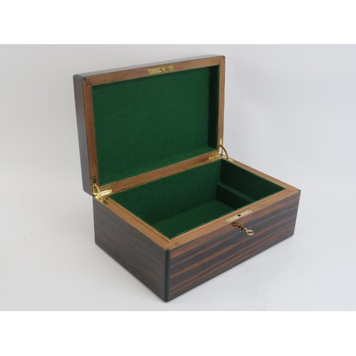 64 - A Dunhill humidor with parquetry inlaid cover, late 20th century. Key and dust cover included. 34.8 ... 