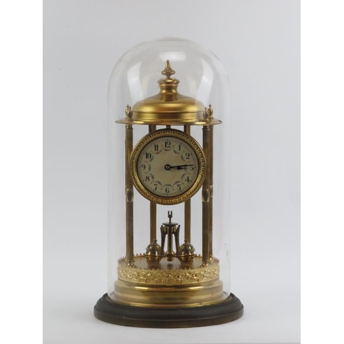 69 - A large French gilt metal anniversary clock with glass dome. Enamelled dial decorated with floral sw... 