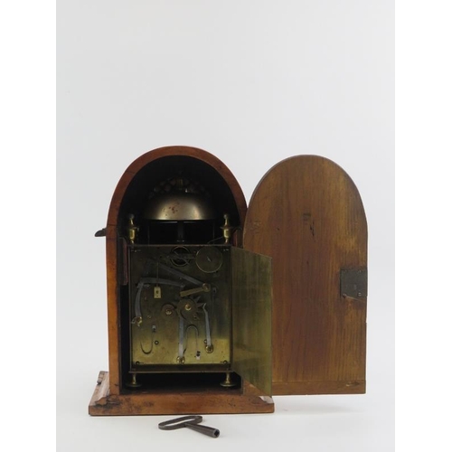 70 - A French birds eye maple housed capucine clock, 19th century. The capucine travel alarm clock housed... 