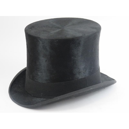 73 - A Victorian Andre & Co Hatters of New Bond Street gentleman’s black silk top hat. A Victorian Lincol... 