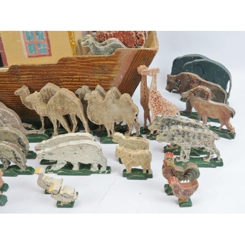 75 - A hand painted carved wood Noah’s Ark with figures, late 19th/early 20th century. Comprising of Noah... 