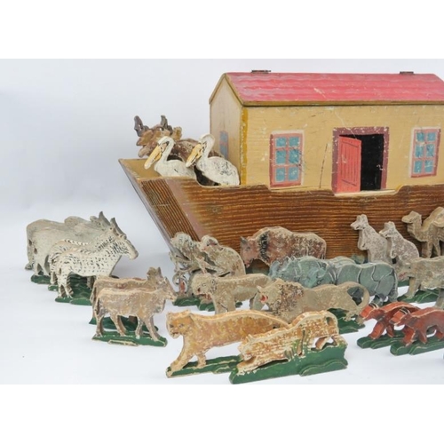 75 - A hand painted carved wood Noah’s Ark with figures, late 19th/early 20th century. Comprising of Noah... 