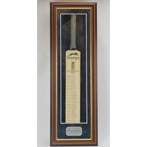 81 - A 2002/03 England Ashes Tour team signed Slazenger cricket bat. Presented in a framed and glazed cas... 