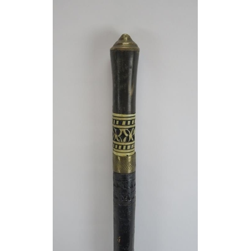 83 - An Anglo Indian ebonised, carved bone and brass mounted sword stick walking cane, late 19th/early 20... 