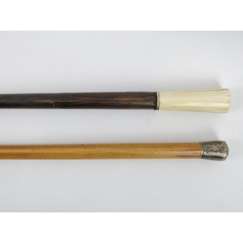 85 - Two antique walking canes. Comprising a silver mounted Malacca cane, mark of H&?, London 1939 and a ... 