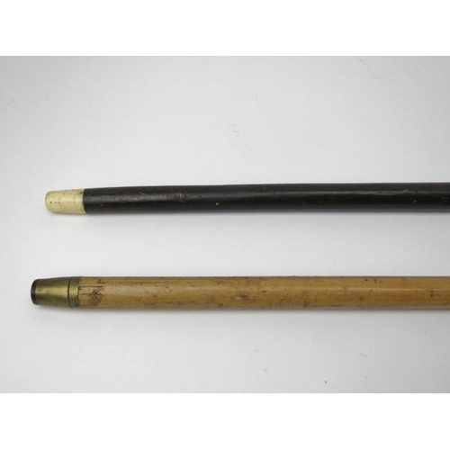 85 - Two antique walking canes. Comprising a silver mounted Malacca cane, mark of H&?, London 1939 and a ... 