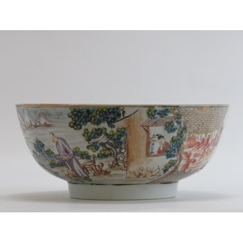 9 - A Chinese Export famille rose gilt and polychrome decorated punch bowl, Qianlong period. Decorated t... 