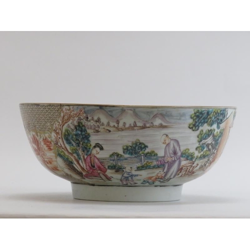 9 - A Chinese Export famille rose gilt and polychrome decorated punch bowl, Qianlong period. Decorated t... 