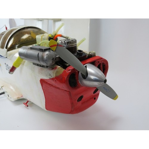 195 - A large Radio Controlled gas engine plane. 115 cm approximate length.
Condition report: Some age rel... 