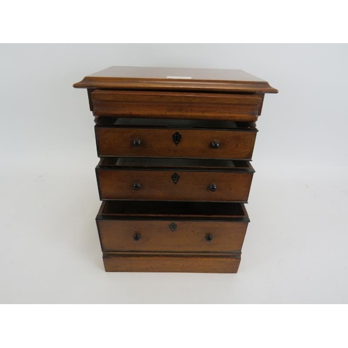 701 - A fine 19th century mahogany miniature apprentice sized Scottish chest, housing blind drawer and thr... 