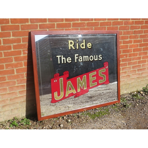 704 - A large early 20th century ‘Ride the famous James’ motorcycling interest advertising mirror, within ... 