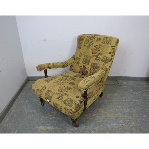 709 - A good 19th century low and deep club armchair by Hampton & Son of Pall Mall, re-upholstered in bota... 