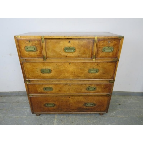 710 - A good 19th century walnut military campaign secretaire chest, housing a central mahogany lined secr... 