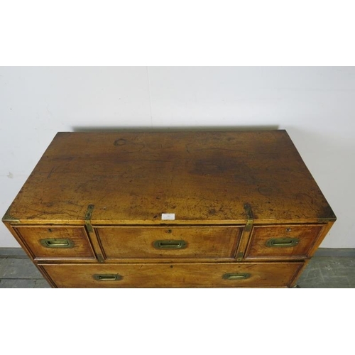 710 - A good 19th century walnut military campaign secretaire chest, housing a central mahogany lined secr... 