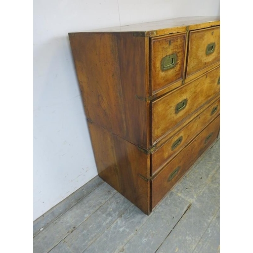 710 - A good 19th century walnut military campaign secretaire chest, housing a central mahogany lined secr... 