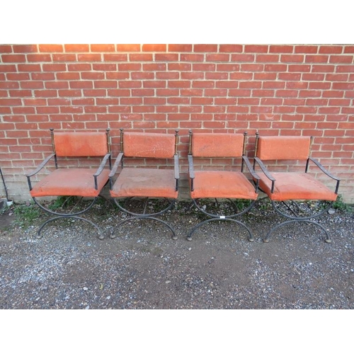 714 - A set of four vintage Hollywood Regency wrought iron and brass throne chairs, upholstered in tangeri... 