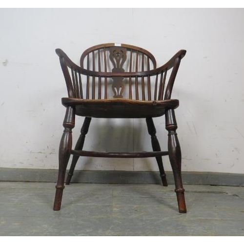 728 - A 19th century elm and yew wood low-back Windsor chair, having shaped and pierced splat, the turned ... 