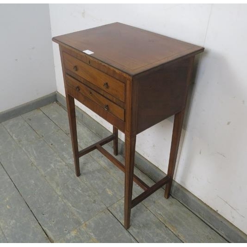 732 - A Georgian mahogany and walnut worktable strung with ebony, the hinged lid opening onto a storage we... 