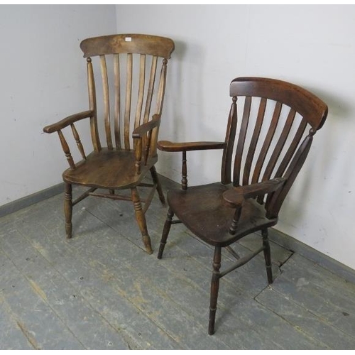 736 - A matched pair of antique elm & beech his & hers farmhouse kitchen chairs, on turned supports with s... 