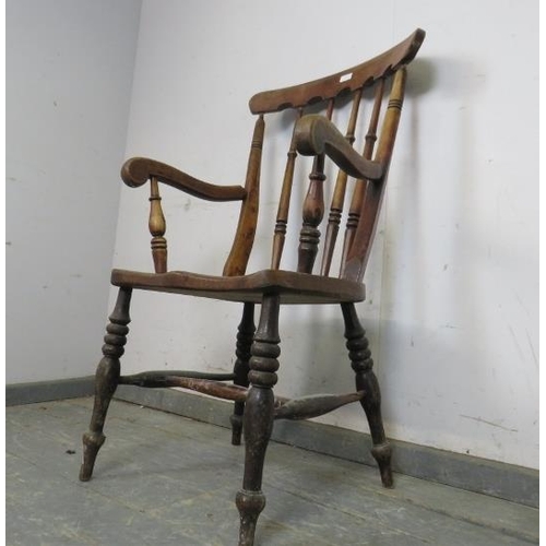 737 - A 19th century elm & beech farmhouse kitchen chair, having arcaded backrest and turned spindles, on ... 