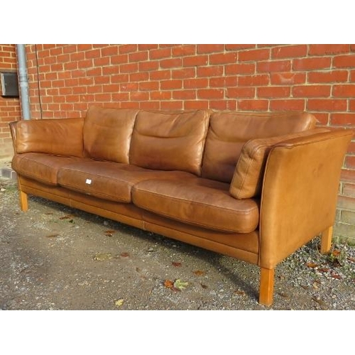 739 - A vintage Danish three-seater sofa in the manner of Borge Morgenson by Stouby, upholstered in supple... 