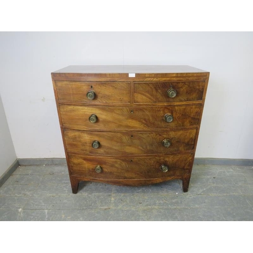 746 - A Georgian, mahogany bow-fronted chest, housing two short and three long graduated drawers, on brack... 