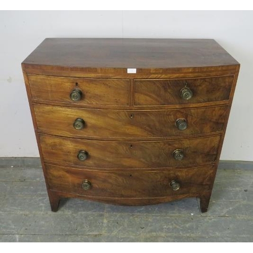 746 - A Georgian, mahogany bow-fronted chest, housing two short and three long graduated drawers, on brack... 