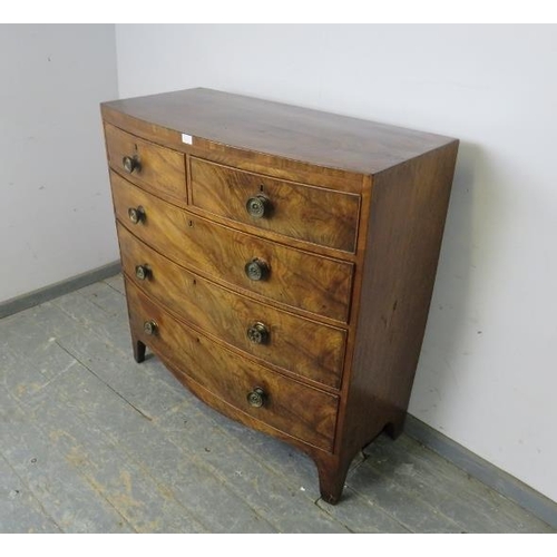 746 - A Georgian, mahogany bow-fronted chest, housing two short and three long graduated drawers, on brack... 