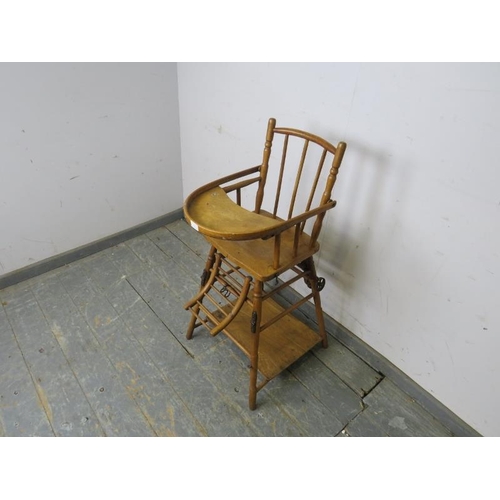 748 - A 19th century beech and walnut metamorphic child’s highchair, on canted supports with stretchers. 
... 