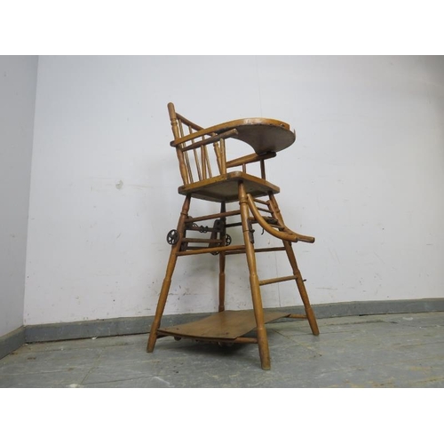 748 - A 19th century beech and walnut metamorphic child’s highchair, on canted supports with stretchers. 
... 