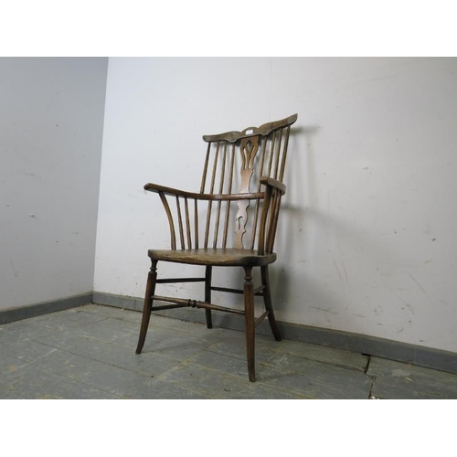 765 - An 18th century and later elm and beech stick-back Windsor chair, the shaped backrest and splat join... 