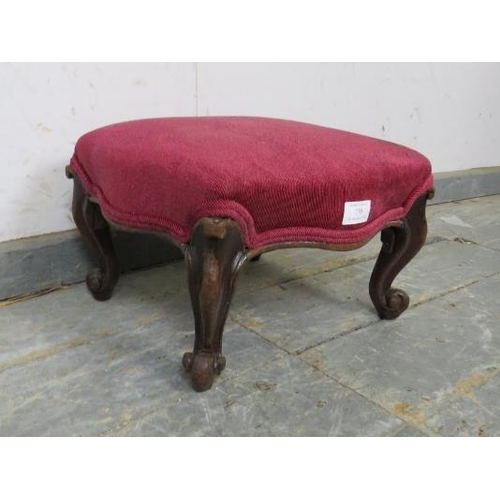 770 - A diminutive Victorian footstool, upholstered in good quality double-piped crimson material, on ogee... 