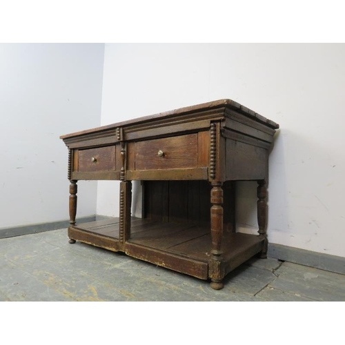 773 - A 19th century country dresser base of small proportions, housing two short drawers with pot-board u... 