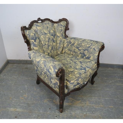 794 - A vintage French show-wood armchair, upholstered in blue and cream floral patterned material with br... 