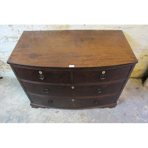 800 - A Georgian mahogany bow-fronted chest housing two short and two long graduated cock-beaded drawers w... 