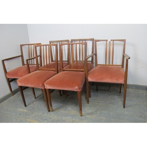 804 - A set of six (4+2) mid-century teak dining chairs by Gordon Russell for Heals, upholstered in faded ... 