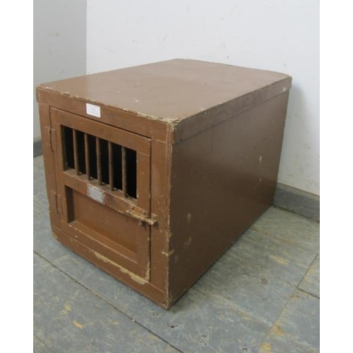 805 - An early 20th century plywood terrier cage painted brown, the barred door with applied plaque ‘EF Ha... 