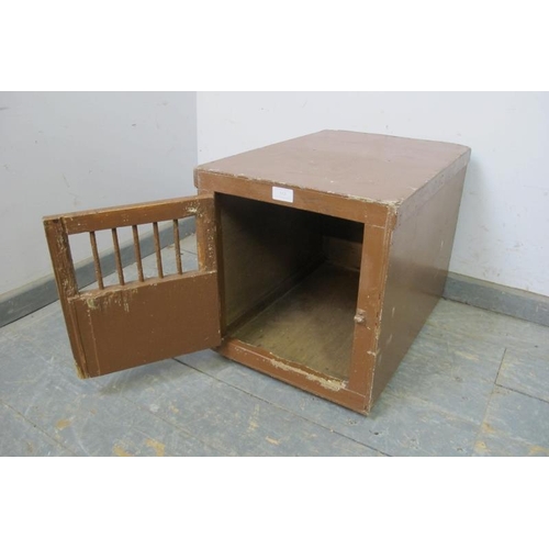 805 - An early 20th century plywood terrier cage painted brown, the barred door with applied plaque ‘EF Ha... 