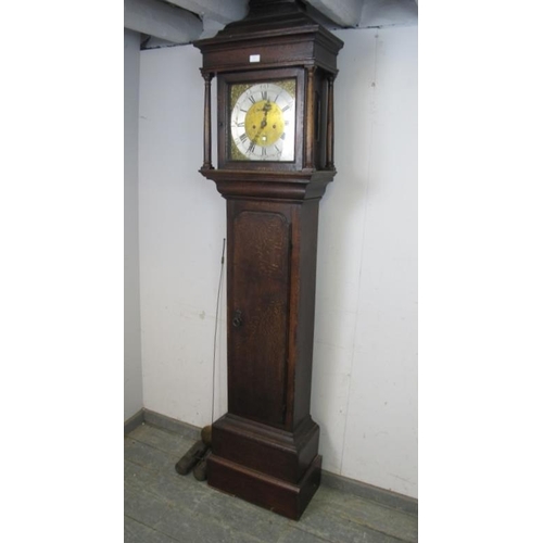 807 - A Georgian oak cased 8-day longcase clock by Nathaniel Brown of Manchester, the hood with stepped co... 