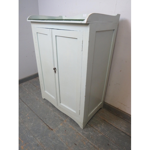 811 - An antique pine cabinet painted grey, the top with ¾ gallery and inset green and cream tiles, above ... 