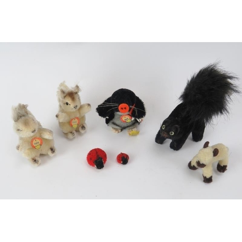 104 - A group of vintage Steiff miniature animals. Comprising two Steiff squirrels, a Steiff mole, a Stein... 